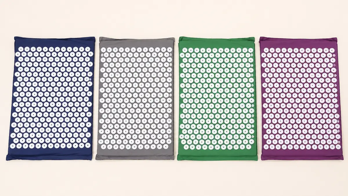 The four SpikeRest mat colours laid flat side by side for comparison
