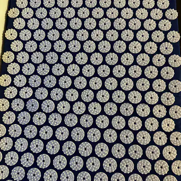 SpikeRest acupressure mat in Navy Blue, photographed by a verified buyer in Estonia